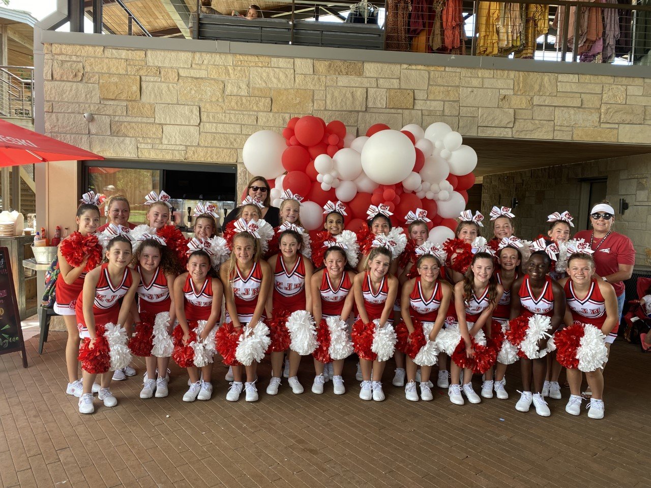 The Katy Junior High cheer squad will perform at the Cane Island End of Summer Bash.